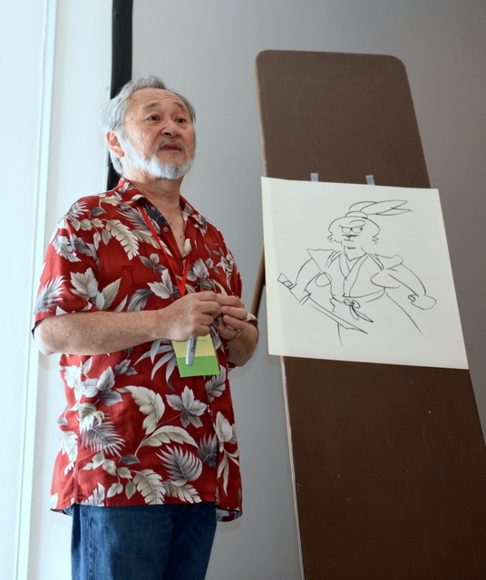 Sensei uses his ninja skills to turn a conference table into an easel.